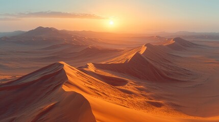 Wall Mural -  the sun is setting in the distance over a desert landscape with sand dunes and a mountain range in the foreground.