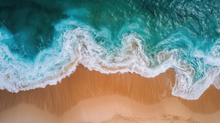 Wall Mural -  an aerial view of a beach with waves crashing on the sand and a sandy beach with a blue ocean in the background.