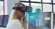 Caucasian woman explores virtual reality in an office