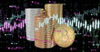 Image of financial data processing over gold coins