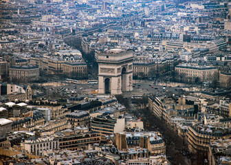 Wall Mural - An aerial view of Arc de Triomphe and the city of Paris from the top of the Eiffel Tower