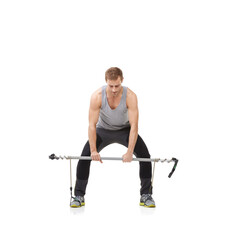 Wall Mural - Exercise, gym and resistance band with a strong man in studio isolated on a white background for health. Fitness, workout or performance and a young athlete training with equipment for wellness