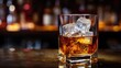 © iloli - glass of whiskey and ice on the bar, check-out, alcohol, quiet luxury