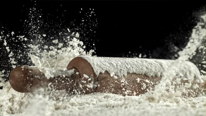 Poster - The rolling pin falls into the flour. Filmed on a high-speed camera at 1000 fps. High quality FullHD footage