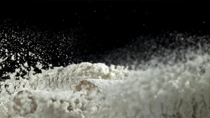 Poster - The rolling pin falls into the flour. Filmed on a high-speed camera at 1000 fps. High quality FullHD footage