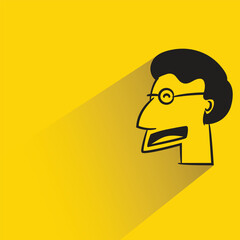 male face icon with shadow on yellow background