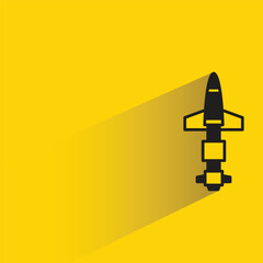 Sticker - missile and rocket icon with shadow on yellow background