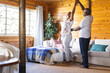 © Wavebreak Media - Happy senior african american couple dancing in living room