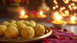 Indian Festival Dussehra, showing golden laddu or laddu made from sweetened condensed milk and sugar.