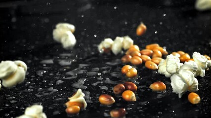 Sticker - Popcorn explodes in a pan with a splash of oil. Filmed on a high-speed camera at 1000 fps. High quality FullHD footage