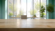 © Planetz - empty wooden table with blurred office  background, for display or montage your products.