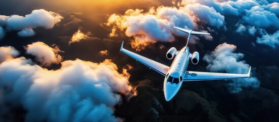 Business jet flying above clouds in dramatic sunset light. Wings of freedom, soaring through vivid skies, a breathtaking sight.