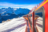Fototapeta  - Eigergletscher alpine railway to Jungrafujoch peak view from train