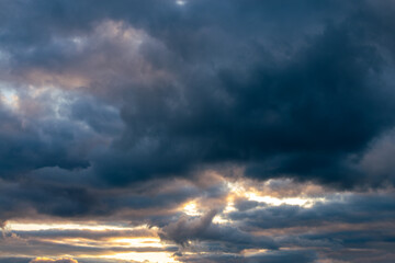 Wall Mural - beautiful moody sky with dark clouds at sunset, sky remplacement, nature background