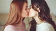 © Andrei - Beautiful young women models kissing each other in a romantic embrace, two girls face to face