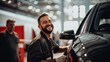 © javier - Skilled automotive painter's content smile