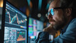 © SashaMagic - A man is busy analyzing financial markets