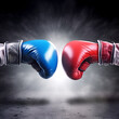 © An Studio - The red and blue boxing gloves are engaged in a fight.