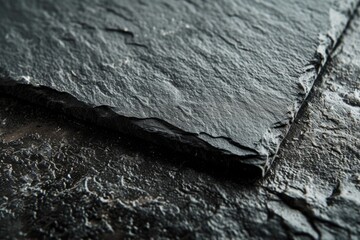 Canvas Print - A piece of slate sitting on top of a table. Can be used for educational or creative purposes