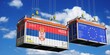Shipping containers with flags of Serbia and European Union - 3D illustration