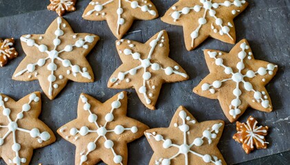 baking cooking christmas and food concept close up of iced gingerbread cookies on black table top