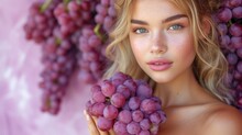  a woman holding a bunch of grapes in front of her face and a bunch of grapes on the other side of her face, in front of a purple background.