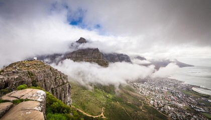 Wall Mural - view of table mountain covered in clouds cape town south africa