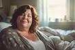 Happy and cheerful fat woman in bedroom looking at camera Concepts of health care, weight loss, diet, weight control and happiness for obese people.