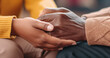 © IBEX.Media - Black Old and young holding hands