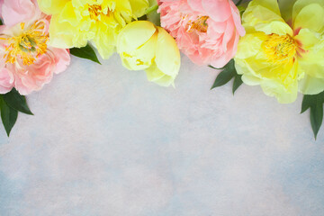 Wall Mural - Yellow and coral peony flowers on a decorative background, space for copy, congratulation text