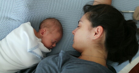 Wall Mural - Mother and newborn baby sleeping napping together