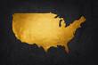 Gold USA map vector silhouette isolated on black background. United States of America map gold design. Strong and powerful economy symbol.
