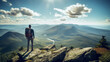 © Cash Cow Concepts - hiker at the summit of a mountain overlooking a river