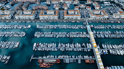 Wall Mural - Aerial view of marina and blue waters of Brighton and Hove, East Sussex, UK