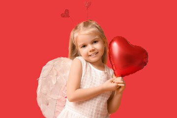 Wall Mural - Cute little girl dressed as cupid with heart-shaped balloon on red background. Valentine's Day celebration