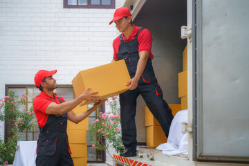 Two Couriers Handing Over Packages to Customers at Home