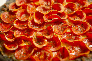 Canvas Print - Pepperoni pizza on cutting board