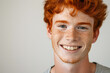 Portrait of a red-haired young man with freckles. AI generative