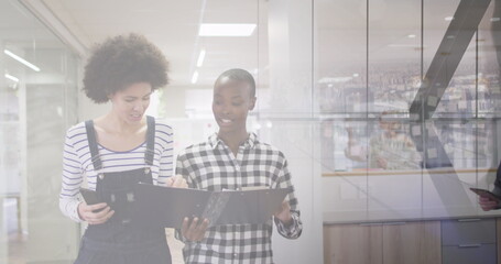 Poster - Image of diverse business people in office over cityscape