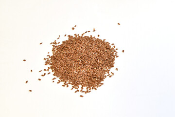 Flax seeds on a white background.