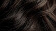 Closeup dark hair. Women's hairstyle. Hair texture
