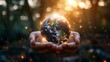 Hands with crystal globe, global network and ecological energy focus