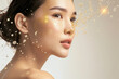 Beautiful Asian woman portrait with gold hydrating serum molecules structure on the face