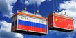 © PX Media - Shipping containers with flags of Russia and China - 3D illustration