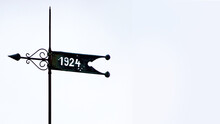 Custom Made Weathervane In Germany With A Year On A Banner. In This Case 1924. With Space For Your Own Text