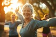 © Simon - A group of mature women doing a workout in the park on a sunny day.