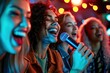 © Alina - Happy friends singing karaoke and having fun in nightclub