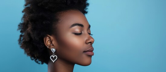 Sticker - Well-groomed lady wearing silver earrings with a heart, set against a blue background.