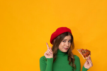 Wall Mural - Beautiful young woman with pizza on isolated orange background.