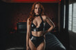 © SOLOTU - Young bdsm style red hair sexy woman portrait in black latex suit or lingerie. Generative Ai